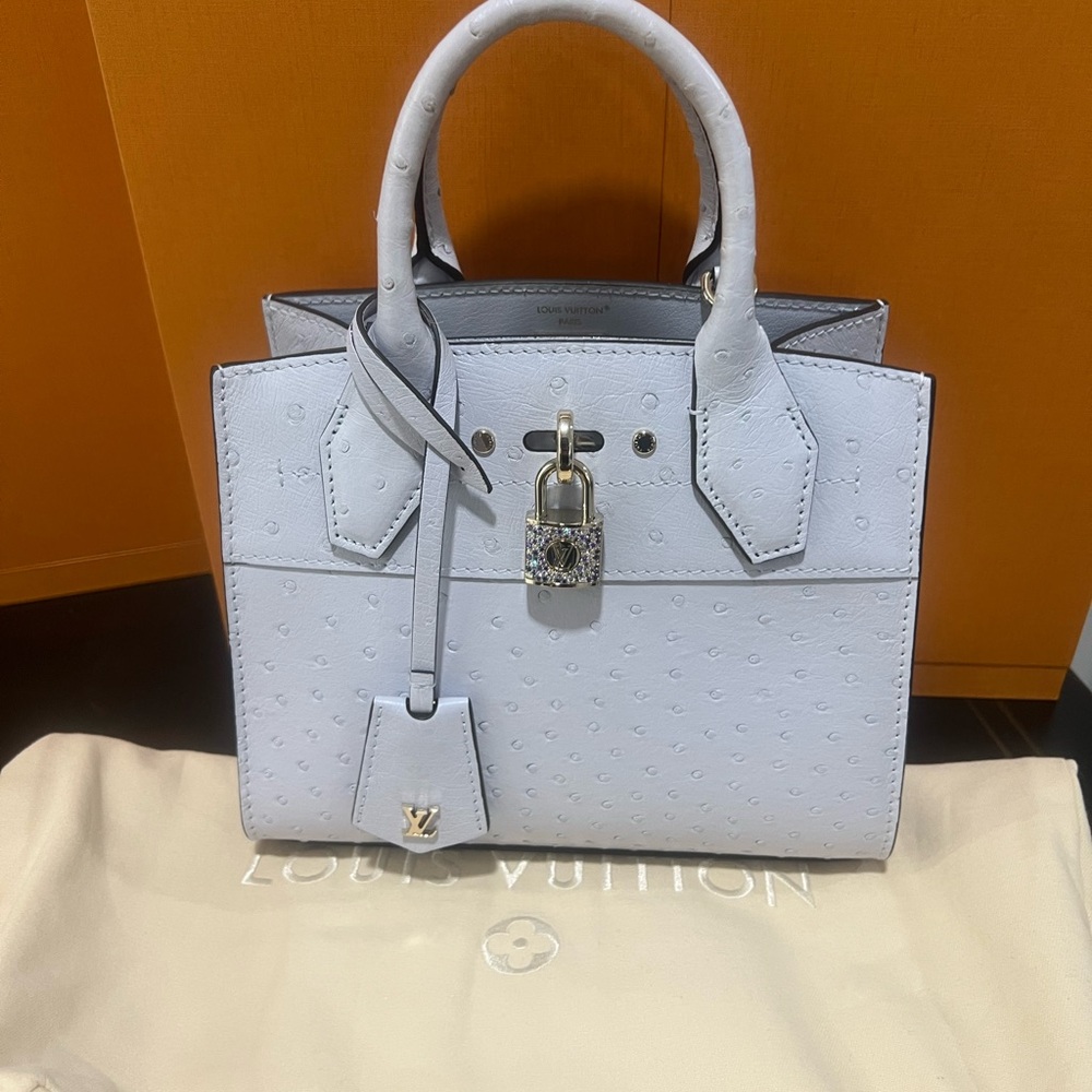 Louis Vuitton exotic ostrich City Steamer PM with Swarovski crystal lock. New